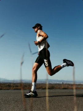 Runner training at sunrise on the seafront